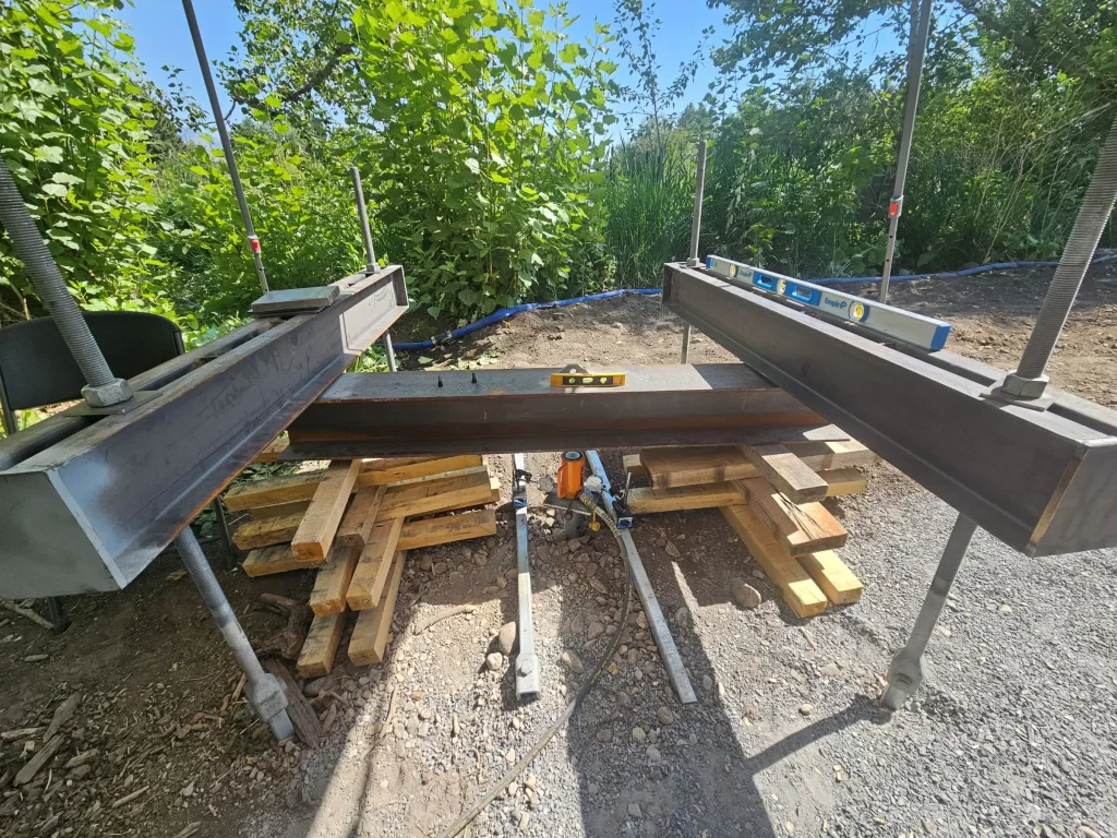 Load testing of helical pier on uneven soils using ASTM-D1143