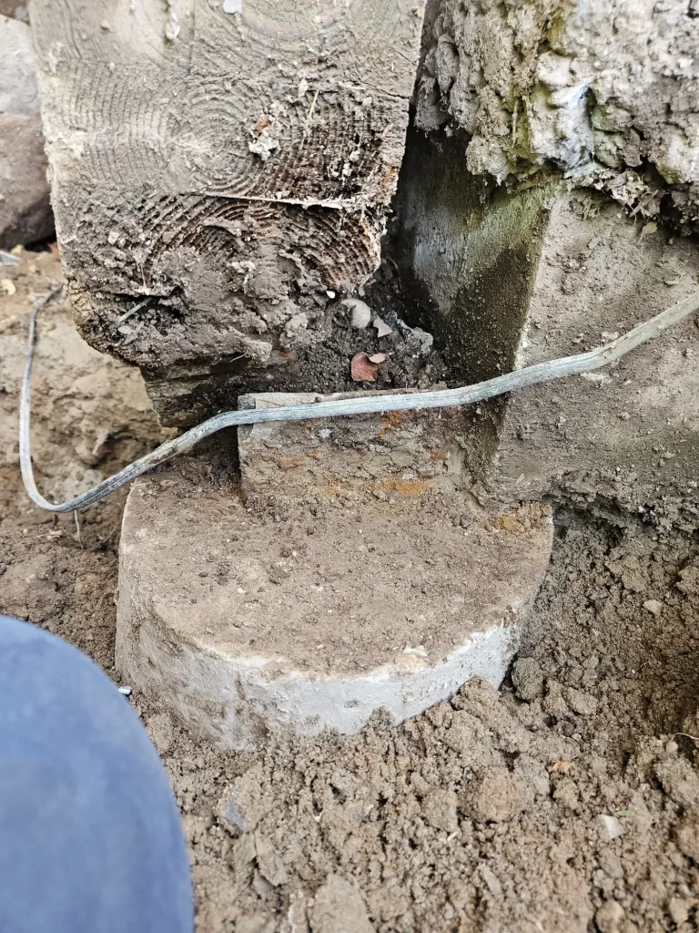 Failed sonotube footing to be replaced by helical pier