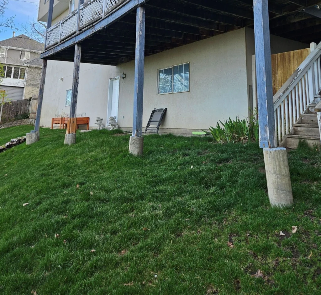 Failed sonotube spot footings placed on a slope