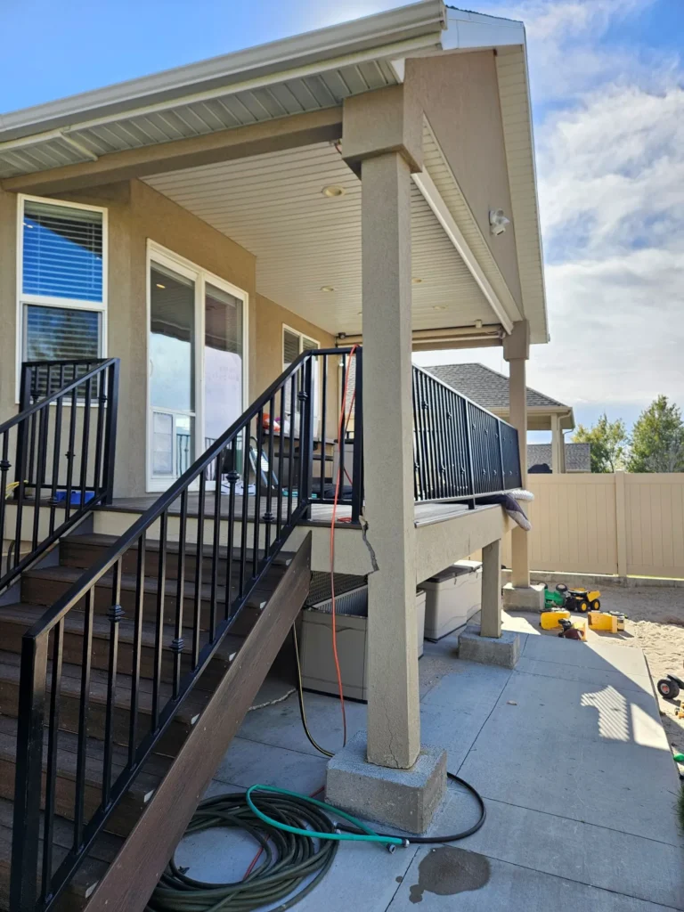 Poured porch footing near foundation sinking from poor soil compaction